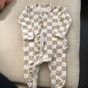 Spearmint baby ruffle butt checkered onesie with feet.